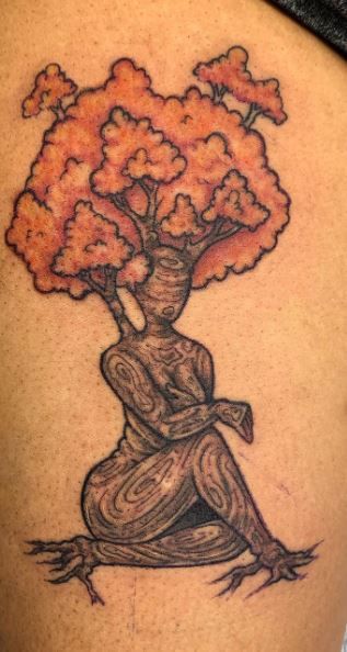 Stunning Tree Tattoos, Designs, Ideas & Meanings Friend Tree Tattoo, Black Woman Leg Sleeve Tattoo, Black Woman Tree Tattoo, Human Tree Tattoo, African Roots Tattoo, Nature Tattoos Black Women, Mother Earth Tattoo Black Woman, Afro Tree Tattoo, Earthy Girl Tattoos Black Women