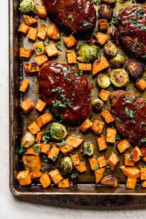 Need something hearty and filling for dinner tonight? Try this Sheet Pan Mini Meatloaf with Vegetables. It's like a Sunday dinner only much simpler and with far fewer dishes to wash. Shaping the barbecue sauce-infused ground beef into mini meatloaves shortens the cooking time so you'll be able to get dinner on the table faster. The best Whole30 sheet pan meatloaf recipe you'll find! || The Real Food Dietitians || Meatloaf With Vegetables, Hello Yummy, Pan Meatloaf, Food Monster, Mini Meatloaf, Mini Meatloaves, Meatloaf Dinner, Real Food Dietitians, Mini Meatloafs