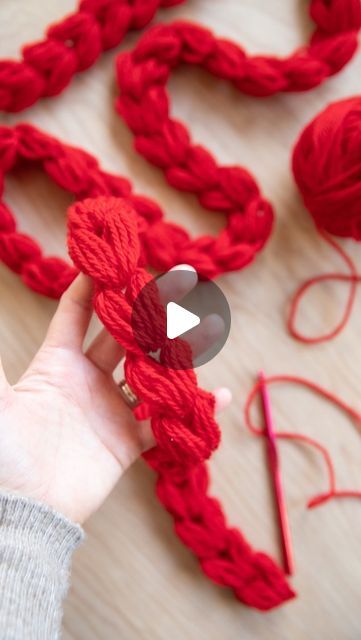 Delia - DIY on Instagram: "Another puff stitch garland but make it hearts❣️❤️🥰

It’s very similar to the chunky crochet garland but it uses thinner yarn, more loops, and is basically a puffier puff that you split in half. If you want the slower more detailed tutorial, it’s on my website and the link in my profile. 😘

Yarn is category 4, 100% wool in bright red from @patonsyarn and the hook is from @boyeyarncrafts . 

#heartgarland #crochetgarland #crochettutorial #beginnercrochet #easycrochet #valentinescrochet #crochetheart #crochetersofinstagram" Crochet Garland, Valentines Crochet, Heart Garland, Puff Stitch, Crochet Heart, Chunky Crochet, The Hook, Crochet For Beginners, My Profile