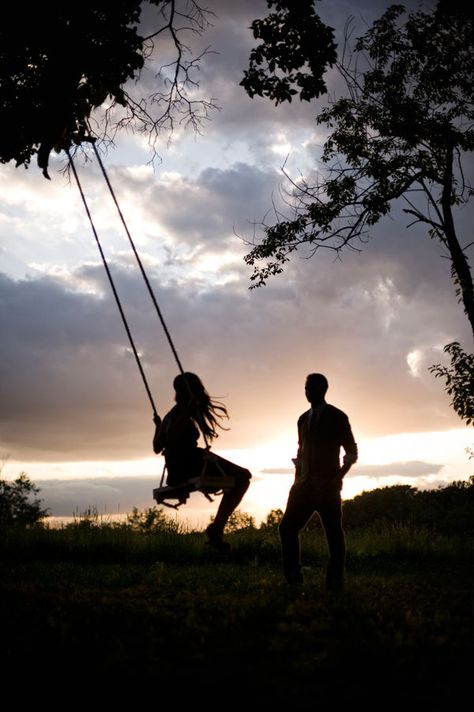 Swings Photography, Cute Couple Silhouette Photography, Couple Swinging, Couple Sitting Under Tree, Couple Tattoo Quotes, Couple Sitting On Tree Branch, Alone In The Dark, Couple Silhouette, Friends Laughing