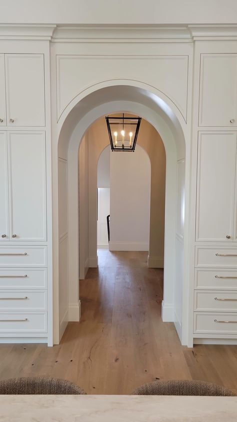 Designs of the Interior (@designsoftheinterior) • Instagram photos and videos Arch Doors Kitchen, Interior Door Arch, Archway Hallway, Archway To Living Room, Interior Archway, Arched Wood Doors Interior, Arch French Doors, Ray Booth Interiors, Arch French Pocket Door