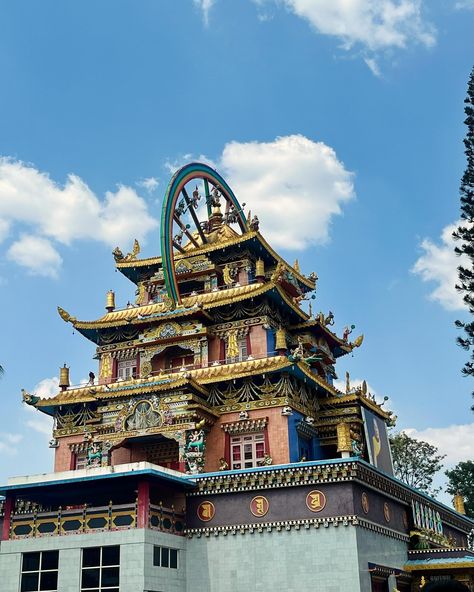 •Golden temple/ Namdroling Monastery, Coorg• One thing that fascinated me the most about this monastery’s architecture was the use of colours, most of them being primary colours and how the entire building is treated as a canvas, both the interiors and exteriors to showcase buddhist culture through art, paintings, intricate detailings on doors, door handles, walls, wall corners, beams, columns, ceilings and the beautiful amalgamation of these elements with golden colour all over. I read som... Namdroling Monastery, Monastery Architecture, Monastery Aesthetic, Buddhist Monastery, Primary Colours, Golden Colour, Golden Temple, Interior And Exterior, Beams