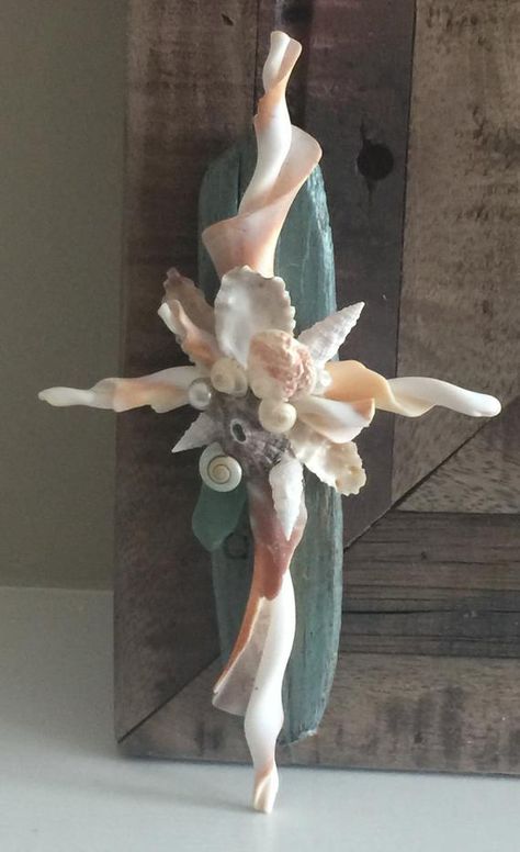 Graceful Cross of beachcombing finds/shells, seaglass, faux pearls mounted on found driftwood. The piece measures 8 1/2 x 4 1/4 inches. Just returning from Florida this cross is made from mostly found material that was lovingly picked up piece by piece from the keys and my home beach in ct. The 3 Beachcombing Finds, Seashell Cross, Shell Cross, Seashell Projects, Art Coquillage, Shells Diy, Shell Crafts Diy, Sea Crafts, Sea Shell Decor