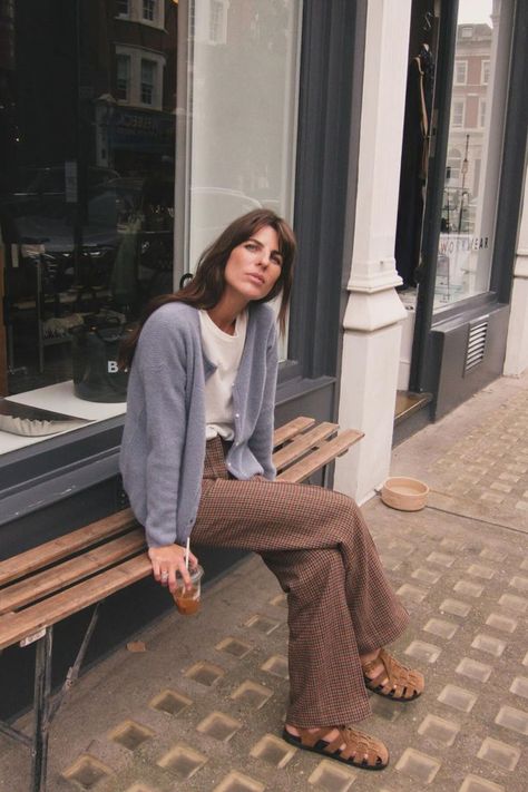 @lauravidrequin is wearing the Sézane Gaspard Cardigan. She pairs it with the Dan Trousers and a classic white tee, making it perfect for any casual outing. Shop this look online now at sezane.com. Sezane Lookbook, Sezane Clothing, Sezane Outfit, Gaspard Cardigan, Parisian Style Outfit, French Wardrobe, Fall Layers, Cardigan Outfits, Cozy Fall