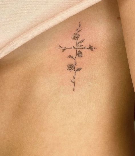 Simple Line Spine Tattoo, Dainty Women’s Tattoos, Dainty Religious Tattoos, Collar Bone And Shoulder Tattoo, Cross Tattoo Placement For Women, Flower Cross Tattoos For Women, Rib Cross Tattoos For Women, Elegant Cross Tattoo, Cross On Ribs Tattoo