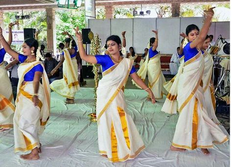 Thiruvathira,traditional dance form of Kerala played especially at the eve of Onam by married ladies in Sarees by forming a circle around the lightened lamp for marital bliss... Onam Festival, Dance Forms, Traditional Dance, Stage Show, Video Capture, The Pride, A Circle, Wedding Card, Music Songs