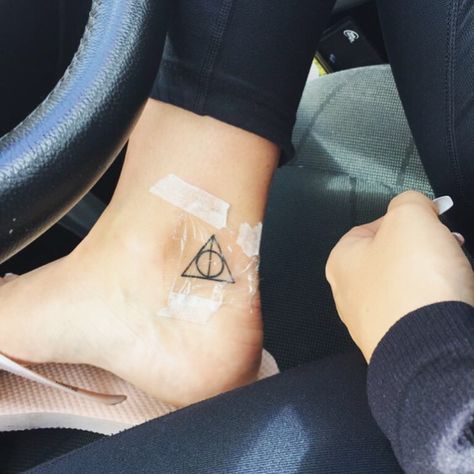 Deathly hallows Tattoo Feminine Deathly Hallows Tattoo, Small Deathly Hallows Tattoo, The Deathly Hallows Tattoo, Deathly Hallows Tattoo Flower, Harry Potter Deathly Hallows Tattoo, Harry Potter Tattoos Deathly Hallows, Subtle Harry Potter Tattoo, Tiny Harry Potter Tattoos, Always Tattoo