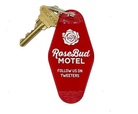 A RoseBud Motel keychain any Schitt's Creek fan will cackle at, followed by their best "Follow us on tweeters!" impression of Alexis. Rosebud Motel, Red Keychain, Motel Key, Vintage Motel, Selfie Ring Light, Schitts Creek, Key Tags, Rose Gift, Gifts Under 10