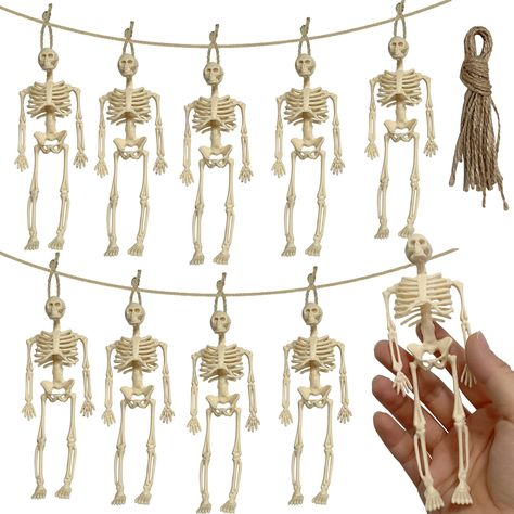 PRICES MAY VARY. MINI HALLOWEEN SKELETONS: Each figurine measures 5.9 inches, making them perfect for adding a spooky accent to your Halloween decorations. Their small size makes them ideal for placing in various locations around your home or yard. Despite their size, they add a noticeable eerie charm. FLEXIBLE AND REALISTIC: Halloween small skeletons can be used for desktop decorations, or string them together to create a skeleton wreath. That fit your Halloween theme. The flexibility adds an e Skeleton Theme Party, Skeleton Pool Party, Mini Skeleton Decorations, Graveyard Party, Full Body Skeleton, Halloween Party Food Skelton, Halloween Graveyard Decorations, Body Skeleton, Miniature Skeleton