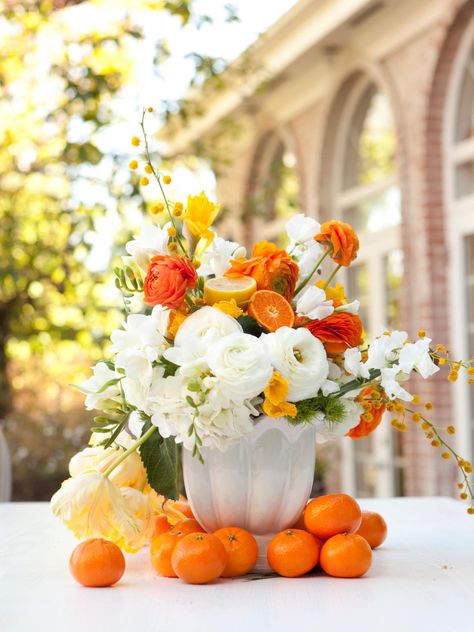 32 Easy Fall Flower Arrangement Ideas | Interior Design Styles and Color Schemes for Home Decorating | HGTV Fruit Bouquet Ideas, Deco Champetre, Table Centerpiece Decorations, Fall Flower Arrangements, Fruit Flowers, Orange Wedding, Beautiful Flower Arrangements, Deco Floral, Ranunculus