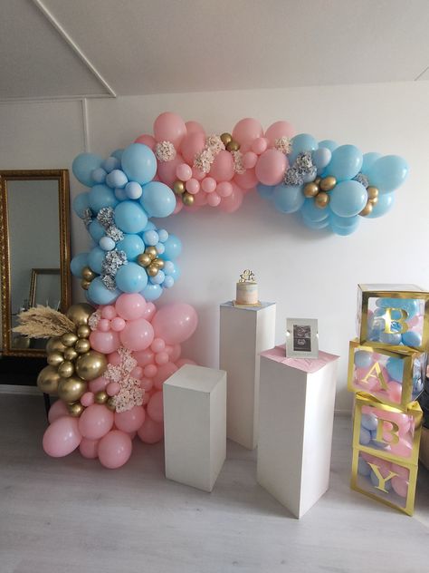 Pink and blue gender reveal balloon garland with baby blocks Pink Blue Gender Reveal Decor, Gender Reveal Design Ideas, Pink And Blue Balloon Decorations, Make It Pink Make It Blue Gender Reveal, Gender Reveal Ideas Pink And Blue, Pink And Blue Gender Reveal Decorations, Blue And Pink Balloon Garland, Coral Birthday Decorations, Pink And Blue Baby Shower Ideas