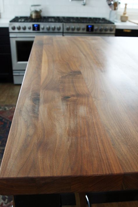 How We Refinished our Butcher block Countertop - Chris Loves Julia Black Walnut Countertop, Farmhouse Countertops, Butcher Block Countertops Kitchen, Cheap Kitchen Countertops, Neutral Cabinets, Wood Counters, Wood Kitchen Counters, Walnut Countertop, Diy Butcher Block