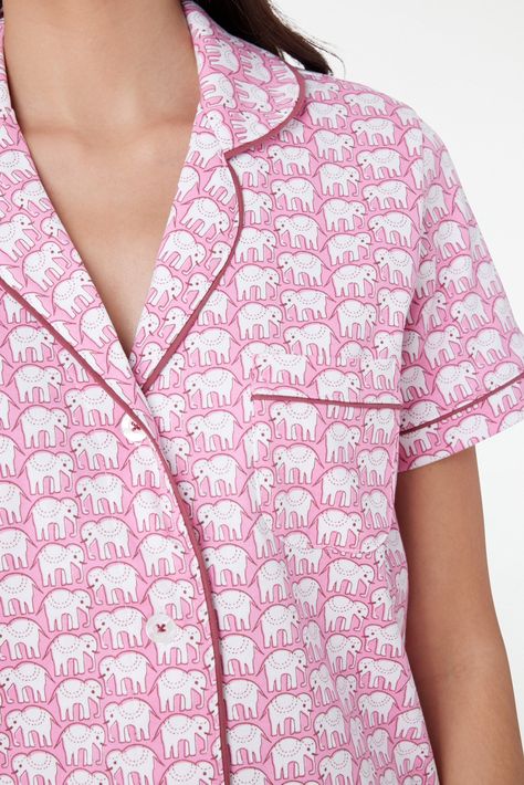 Hathi See, Hathi Do, Hathi Pink, Hathi Blue! Our original fan-favorite Hathi elephant print is here in our cult classic polo set made of 100% premium cotton. Button Front Closure Functional Breast Pocket Contrast Piping Detail Mid-Rise Elastic Waist Materials and Care 100% Premium Cotton Machine Wash Cold, With Like Colors Do Not Bleach, Tumble Dry Low (Line Dry Recommended) Imported Measurement Information Model Wears Size Small Size S Length: 25.5" (from Shoulder) Size S Sleeve Length: 7" (fro Sleepover Bag, Monkey Print, Cute Pajama Sets, Roller Rabbit, Footie Pajama, Baby Pajamas, Cute Pajamas, Elephant Print, Short Pajama Set