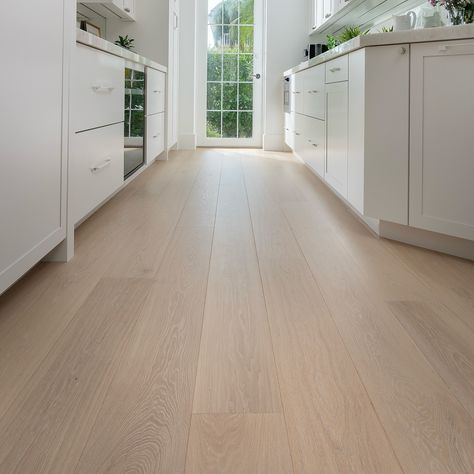 Discover the elegance of European White Oak in our new Mercury shade. Now available in 8” select grade for a truly refined finish. Explore more and get your complimentary samples via the link in bio✨ #JamailHardwoods #HoustonLuxury #WhiteOakElegance #EuropeanHardwood #InteriorPerfection #LuxuryLiving #DesignInspiration #CustomHomes #HardwoodStyle #HoustonInteriors” White Oak Kitchen Floors, Classy Flooring, Oak Floor Kitchen, White Oak Flooring, White Oak Kitchen, White Oak Hardwood Floors, Oak Hardwood Flooring, White Oak Floors, Oak Kitchen