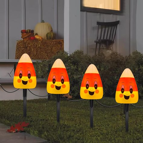 PRICES MAY VARY. ✨Halloween Pathway Lights Outdoor: 7 Ft Halloween decorations walkway markers lights with 4 corncob lights and 4 stakes, 24 inch lead with male plug, 12 inch spacing between candy cob lights, 6 inch tail with female connector, total length 7 feet. fall decorations outdoor string lights an illuminated path thanksgiving and creepy Halloween atmosphere. ✨End to end connectable: Each strands outdoor pumpkin stake lights 2.4 watts, halloween pathway stake lights can connect up to 180 Simple Halloween Yard Decor, Cute Halloween Decor Outdoor, Cute Outdoor Halloween Decorations, Simple Halloween Decor Outdoor, Cute Halloween Decorations Outdoor, Halloween Home Decor Outdoor, Outdoor Halloween Decor Front Yards, Simple Outdoor Halloween Decor, Corn Decorations