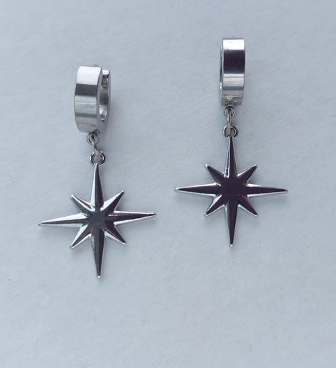 The earrings are adorned with a small star-shaped pendant. The earrings are fastened with stainless steel studs. Earring length - 7.0 cm (2.7 inches) Earrings  are packed in a gift box RECOMMENDATIONS FOR CARE: Do not wet, do not drop, and store in a dark box! - Remove jewelry before exercising, swimming, showering and sleeping. - Avoid contact with moisture such as make-up, moisturizer, lotion, perfume and hairspray. - Store your jewelry in a box or pouch after use. Earrings Grunge, Star Earrings Silver, Grunge Earrings, Polar Star, Earrings Gothic, Silver Star Earrings, Grunge Jewelry, Celestial Earrings, Gothic Earrings