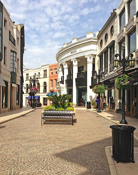 Rodeo Drive is a two-mile-long street in Beverly Hills Rodeo Drive Beverly Hills, Las Vagas, Rodeo Drive, Ancient Ruins, Dream Board, Drive In, Pop Up Shop, Main Street, Rodeo