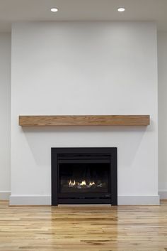 Modern Fireplace With Mantle, Simple Modern Fireplace, Fireplace With Mantle, Modern Mantle, Modern Fireplace Mantels, Fireplace Redo, Build A Fireplace, Fireplace Tile Surround, Fireplace Remodel