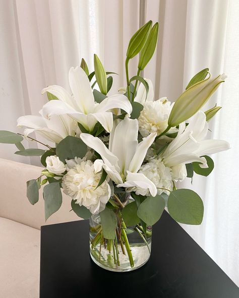 Flower Arrangements Lilies, White Floral Centerpieces With Eucalyptus, Lily Arrangement Vase Centerpieces, Lily And Hydrangea Arrangement, White Lily Arrangements, White Flower Centerpieces With Greenery, Lily Flower Arrangements Vase, Lilly Arrangements, Lily Flower Arrangements