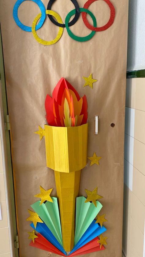 Olympics Door Decor, Olympic Float Ideas, Olympic Party Decorations Diy, Olympic Games Party Decorations, Olympic Theme Classroom Decorations, Olympics Decorations Ideas, Olympic Themed Bulletin Board, Olympic Vbs Decorations, Olympics School Theme