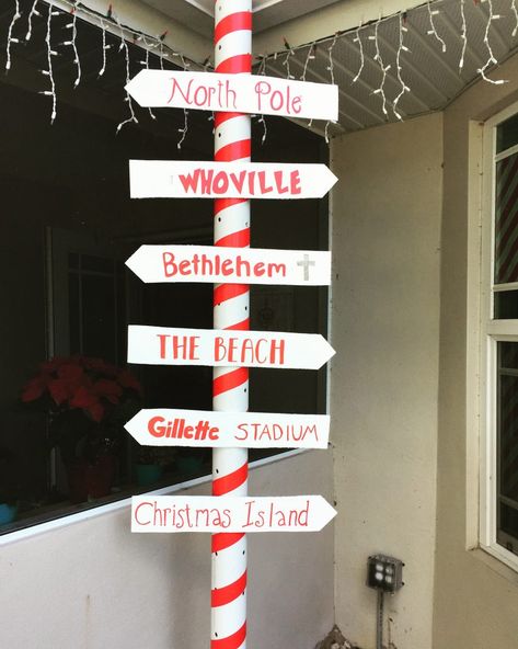 DIY Christmas Sign Post Diy Directional Sign Post Christmas, Diy Sign Post, Christmas Sign Post, Diy Directional Sign Post, Wooden Sign Posts, Christmas Lamp Post, Christmas Doors, Christmas Signs Diy, Laser Cut Christmas