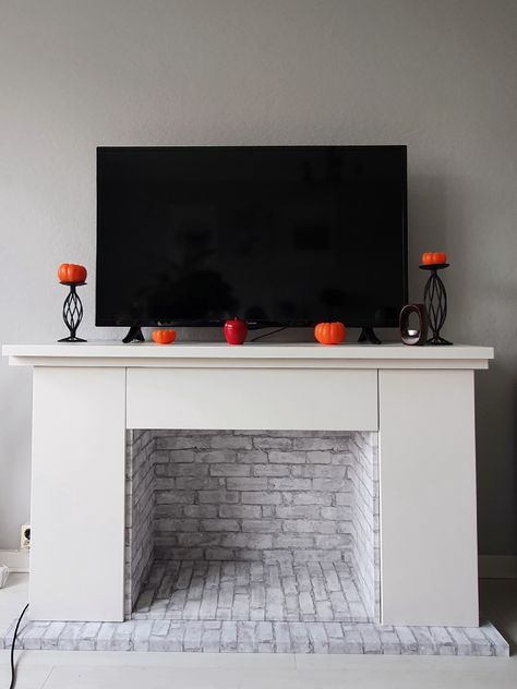 Faux fireplace mantel - IKEA hack Ikea Fireplace Hack, Ikea Fireplace, Fake Fireplace Diy, Faux Fireplace Mantel, Ikea Kitchen Planning, Blue Grey Living Room, Brick Pattern Wallpaper, Ikea Kitchen Planner, Faux Fireplace Mantels