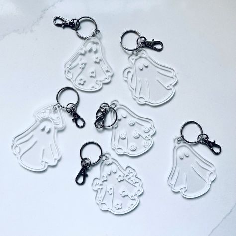 "Looking for a spooky-cute keychain to add to your collection? Look no further than our Daisy Ghost Keychain! This adorable keychain features a laser-engraved daisy ghost design in clear acrylic. Choose between the cute option or the sassy option, with its tiny middle fingers standing up. Both options measure approximately 2.75 inches and are made in the USA from eco-friendly wood sourced from sustainable forests. So why wait? Add a little spookiness to your keys today with our Daisy Ghost Keych Ghost Keychain, Ghost Bag, Middle Fingers, Halloween Retro, Boo Basket, Retro Daisy, Beach Lover Gifts, Acrylic Keychains, Scrapbook Stickers Printable