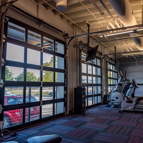 Say goodbye to the unpleasant smell that comes to mind when you think of your local gym, and HELLO to a fresh, natural breeze 🍃💨

Would you work out in this gym? Gym With Garage Door, Extra Large Garage Door, Barn Gym Ideas, Shed With Garage Door, Aluminum Garage Doors, Patio Gym, Barn Gym, Gym Door, Warehouse Gym