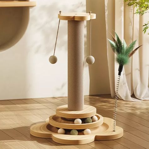 Overview Discover the ultimate play station for your feline friend! Our Pine Wood Cat Scratcher Tower with Interactive Turntable Balls combines sturdy design, engaging features, and multi-functional scratching solutions to keep your pet happy and active. Crafted from premium pine wood, this scratcher is not only durable but also a stylish addition to your home decor. Product Features Constructed with high-quality pine wood for durability and stability. Features multiple tiers and sizes to accommodate cats of all sizes and ages. Incorporates interactive turntable balls that captivate and stimulate your cat’s hunting instincts. Includes a natural sisal-covered scratching board to promote healthy claws. Benefits Keeps your cat entertained for hours, reducing potential boredom and destructive Cat Scratcher Post, Scratcher Cat, Cat Scratchers, Play Station, Small Animal Supplies, Wood Cat, Natural Sisal, Cat Scratcher, Scratching Post