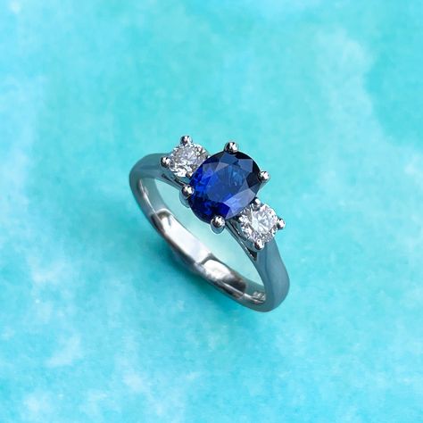 When it comes to Sapphire rings, we can't help but dream of sunny days and vacation getaways! . . . . . . . #jewellery #handmade #rings #love #bespoke #bespokejewellery #diamondjewelry #diamond #diamonds #diamondjewellery #diamondrings #diamondring #proposal #bespokedesign #engagementrings #engagementring #engagement #proposals #birthstone #sapphire #trilogy #sapphirering #engaged #jeweller #shesaidyes Sapphire Trilogy Engagement Ring, Platinum Sapphire Engagement Ring, Diamond And Sapphire Engagement Ring Three Stone, Engage Ring, Sapphire Colour, Sapphire Wedding Set, Oval Sapphire Engagement Ring, Trilogy Engagement Ring, Ring Inspo