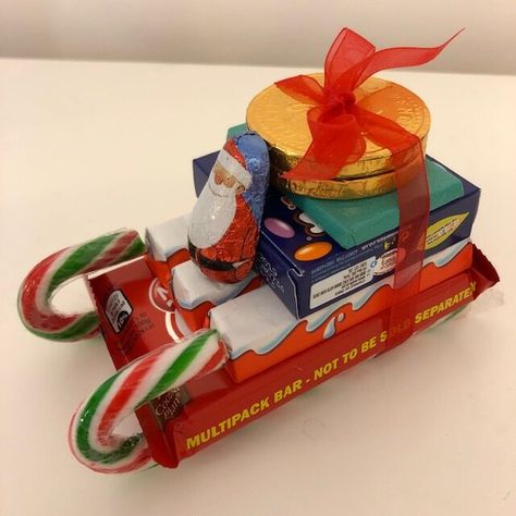 Christmas Sweet Sleigh, Chocolate Santa Sleigh, Candy Sleighs For Christmas, Brrrr Basket, Chocolate Sleigh, Santa Sleigh Candy, Candy Tower, Christmas Sleighs, Diy Christmas Decorations Dollar Store