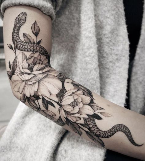 Snake In Garden Tattoo, Tattoos That Arent Flowers, Snake And Flowers Tattoo Half Sleeves, Snake And Flower Tattoos For Women, Feminine Dragon Tattoo For Women Arm, Forearm Snake Tattoo Women, Snake Sleeve Tattoo Women, Snake In Flowers Tattoo, Snake And Flowers Tattoo Arm