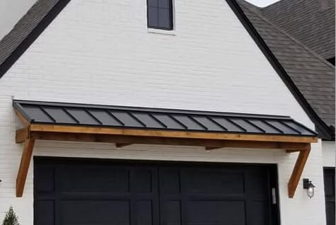 Metal Garage Awning, Garage With Awning, Standing Seam Metal Awning, Metal Eyebrow Over Garage, Awnings Over Garage Doors, Metal Roof Awnings, Shed Porch Roof Ideas, Garage Awnings Exterior, Garage Eyebrow Roof