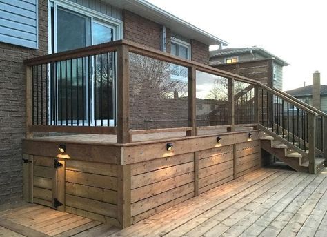 35+ Easy & Inexpensive Deck Skirting Ideas and Designs (2021) Multiple Level Deck Ideas, Wood Underpinning, Bilevel Deck, Front Deck Ideas Entrance Porch Designs, Shed Under Deck, Deck Lattice, Porch Skirting, Deck Skirting Ideas, Small Decks