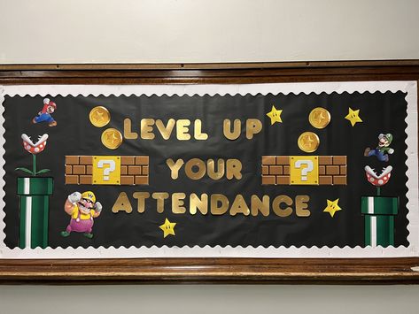 Attendance Bulletin Board Ideas Middle School, Attendance Bulletin Board Ideas Display, Attendance Competition Bulletin Board, Level Up Theme For School, School Office Bulletin Board, Video Game Classroom Door Ideas, Attendance Bulletin Board, Gaming Bulletin Board Ideas, Game On School Theme