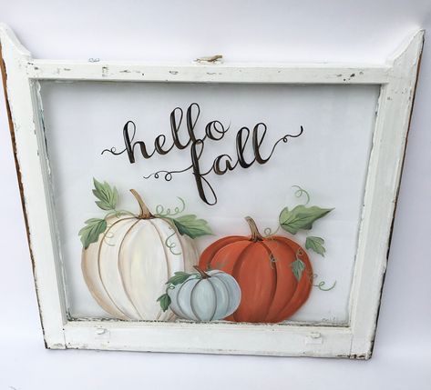 "Hello Fall! Nothing adds charm and character to your home or office decor than a vintage painted window. Using glass paint, I hand paint a cheerful pumpkin scene to give you a lovely view of fall! The \"Hello Fall\" is painted in a dark brown color. The windows I have come in a variety of sizes and pane configurations. We can work together to see what styles I have available to fit the look and size that you need. Each window is mounted with two strong hangers to hang on your wall. I welcome cu Painted Window Panes, Fall Window Painting, Old Windows Painted, Old Window Art, Old Window Crafts, Hand Painted Windows, Painted Window Frames, Painted Window Art, Painting On Glass Windows