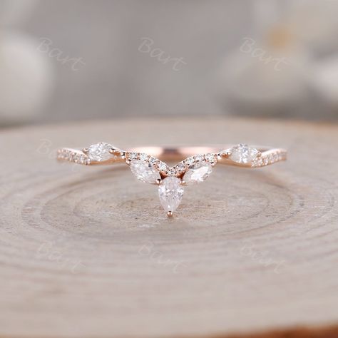 Curved 4x2mm Marquise Shaped Moissanite Wedding Stacking Ring, Half Eternity Moissanite Matching Band in 14k Rose Gold. Women Engagement Ring Custom Wedding Band, Art Deco Anniversary Ring. ◆ Product Specifications Main ring Metal: 10/14/18k Solid Rose/Yellow/White Gold, Platinum, Rose/White/Yellow Gold Plated is available Stone:Moissanite or CZ Diamond Shape: Marquise Shaped & Pear Cut,Round Cut Setting: Prong, Pave Set, Half Eternity Band Width:1.3mm  *Similar ring design: https://www.etsy.com Stacked Pear Wedding Rings, Pear Shaped Wedding Band, Nesting Wedding Band, Wedding Band Pave, Branch Wedding Band, Anniversary Bands For Her, Pear Wedding Ring, Pear Diamond Rings, Stacked Wedding Bands