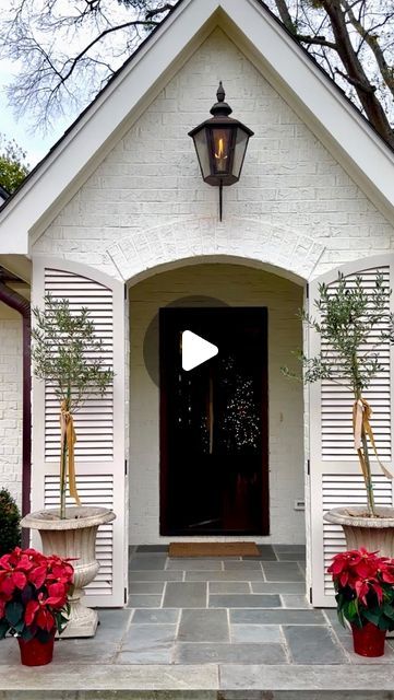 RIVER BROOK on Instagram: "Who else is dreaming of a white Christmas? 🤍
This exterior renovation turned this 1950’s gem into a dream home. From the charming front porch with an arched entry to custom shutters, a new gable roofline, and a bay window flooding the interiors with natural light, every detail tells a story. The soft white paint color (White Dove by Benjamin Moore) embraces elegance, while the bluestone patio and lush landscape invite you to enjoy the beauty outdoors. Here’s to honoring the original design with a touch of modern magic! #riverbrookdesign #riverbrookconstruction #riverbrookinteriors #HomeRenovation #TimelessDesign #1950sRevival" White Dove Exterior, Soft White Paint, Paint Color White, Arched Entry, White Paint Color, Lush Landscape, Custom Shutters, Bluestone Patio, Dreaming Of A White Christmas