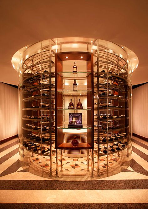 Wine Cabinet Design, Spiral Wine Cellar, Wine Shop Interior, Wine Room Design, Glass Restaurant, Ditsy Floral Blouse, Metal Cabinets, Glass Wine Cellar, Rose Gold Satin