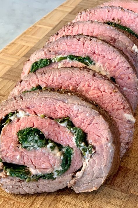 Flank Steak Stuffed, Stuffed Flank Steak, Flank Steak Recipes, Garlic Spinach, Grilled Dinner, Holiday Meal, Holiday Meals, Supper Recipes, Easy Family Dinners