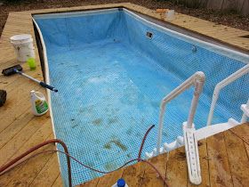 below: My husband felt that pool above was awful and so he consented to a new Intex Ultraframe 12'x24'x54" above ground pool to "try-out" pool ownership. Sounded great to me. And much cheaper with less commitment. So I ordered the below pool end of June 2012 from Wal-mart because they had the best deal and it was supposedly in stock for home delivery. But it didn't arrive and then it was said to be on back order but would be here 2nd week of July. It didn't arrive until Pool Inground, Intex Above Ground Pools, Swimming Photos, Pool Diy, Swimming Pool Decks, Intex Pool, Pools Backyard, Rectangular Pool, Above Ground Pool Decks