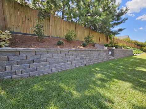 Retaining Wall Front Yard Slope, 8 Ft Fence, Side Yard Design Ideas, Short Brick Retaining Wall, Retaining Wall Ideas Hillside Backyard, Backyard Tall Retaining Wall Ideas, Retaining Wall For Pool Sloped Backyard, Back Yard On A Hill Sloped Yard Retaining Walls, Retaining Wall Ideas Hillside