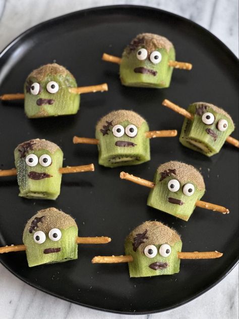 How to Make Kiwi Frankenstein's - Melissa's Healthy Kitchen Halloween Snack Tray, Spooky Breakfast, Celery Peanut Butter, Clementine Pumpkins, Halloween Taco Dip, Peanut Butter Substitute, Breakfast Charcuterie Board, Breakfast Charcuterie, Double Stuffed Oreos