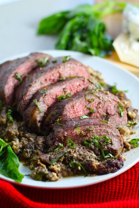 This is seriously one UNBELIEVABLE STUFFED FLANK STEAK!  The steak in my recipe is so tender and oozing with flavor.  The stuffing has mushrooms,  onions, garlic, fresh parsley and basil, then parmesan, and goat cheese!!!  This is the perfect Christmas Dinner.  #christmasdinner #beefroast #stuffedbeef #beefrolls #mushrooms #flanksteak #steakrecipes #holidaydinner Stuffed Flank Steak Recipes Goat Cheese, Autumnal Meals, Stuffed Flank Steak, Current Recipes, Perfect Christmas Dinner, Mushroom Stuffed, Flank Steak Recipes, Food Beef, Cheese Roll