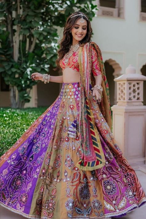 We have been loving multicolour lehengas off late, not just for the mehendi or the haldi, but even for the wedding, and we love the brightness and vibrance they bring. Multicoloured lehengas are trending right now, and here are some that we are crushing on currently! Mehndi Hairstyle, Haldi Outfit For Bride, Mehndi Look, Mehendi Lehenga, Mehendi Dress, Mehandi Outfits, Hairstyle Indian, Garba Outfit, Mehndi Outfit