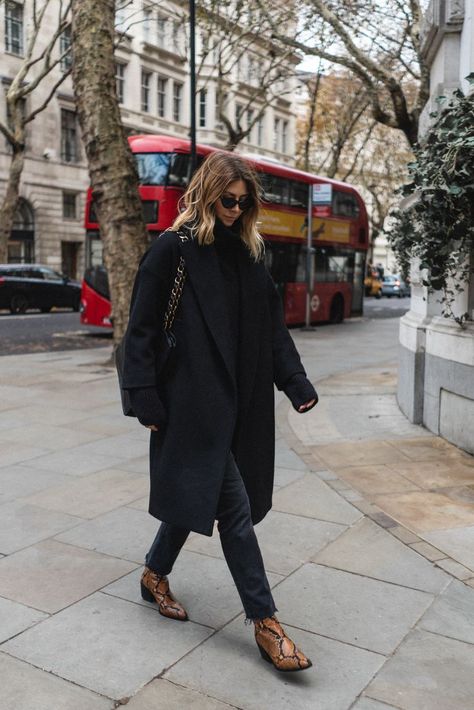 Emma hill wears chic all black Winter outfit with snakeskin boots Long Black Coat Outfit, Snakeskin Boots Outfit, Outfit Nero, Black Coat Outfit, Chic Fall Fashion, Fall Fashion Coats, Womens Black Booties, Snakeskin Boots, Long Black Coat