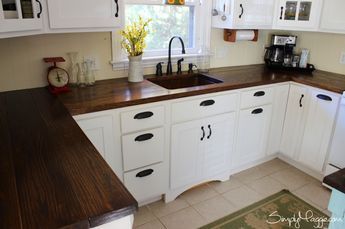 DIY Wide Plank Butcher Block Counter Tops | simplymaggie.com Sinks With Butcher Block Counters, Kitchen Cabinet Color Ideas With Butcher Block Counter Tops, Wood Countertops With White Cabinets, Black Sink Wood Countertop, Plywood Kitchen Countertops, Kitchens With Wood Countertops, Budget Countertops, Plank Countertop, Wooden Countertops Kitchen