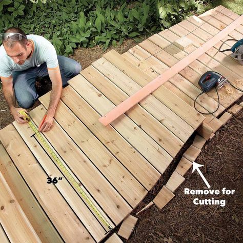 cut the opposite side boardwalk Raised Wooden Walkway, Diy Wood Pathway, Diy Wooden Pathways, Raised Walkways Paths, Raised Garden Paths And Walkways, Diy Wooden Walkway, Diy Wood Walkway, Diy Boardwalk Path, Wooden Garden Path