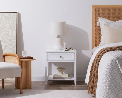 A key piece of bedroom furniture. Bedside tables offer vital space and storage for your bedtime essentials. Find perfect bedside tables, nightstands, and on-trend bedroom furniture. #BedroomInspo #HomeDecor #NightstandGoals #BedsideTable #ModernHome #InteriorDesign #HomeStyling #BedroomIdeas #FurnitureFinds #CozySpaces #Mocka Modern Bedroom Side Tables, Mocka Furniture, Bedside Table White, Bedside Table Styling, Nightstand Design, Bedside Table Decor, Contemporary Nightstand, White Bedside Table, Modern Bedside Table