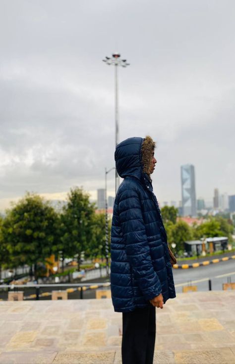 Stay cozy and stylish on a rainy day with this deep blue rain puffer jacket. The quilted design adds texture and dimension to the jacket, while the rich blue color creates a moody and atmospheric aesthetic. The oversized fit of the jacket adds a touch of effortless cool to any outfit, and the practicality of the rain-resistant material ensures you stay dry and comfortable. Pair it with some black skinny jeans and chunky boots for a chic and edgy look that will keep you warm and dry all day long Atmospheric Aesthetic, Blue Rain, On A Rainy Day, Rain Or Shine, Rock A, A Rainy Day, Edgy Look, Chunky Boots, Look Stylish